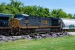 CSX 7230 trails on a northbound manifest 